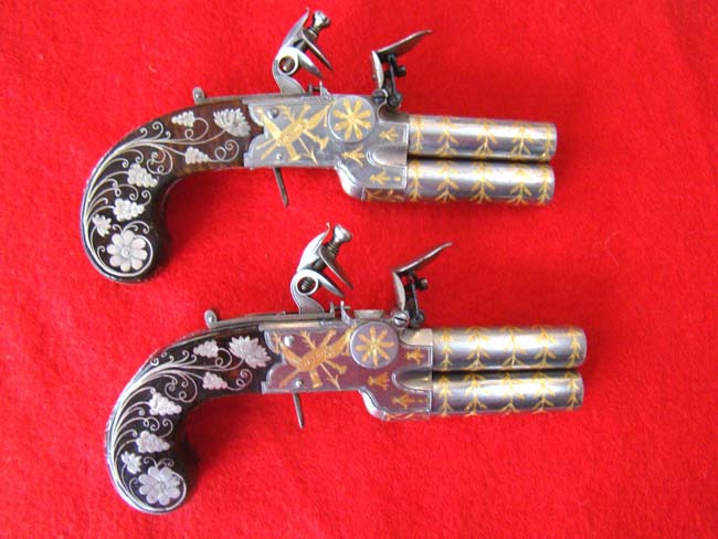 Possibly the FINEST pair of English Gold and Silver Inlaid Flintlock Over and Under Pocket Pistols on the market today! Circa 1800-1810.